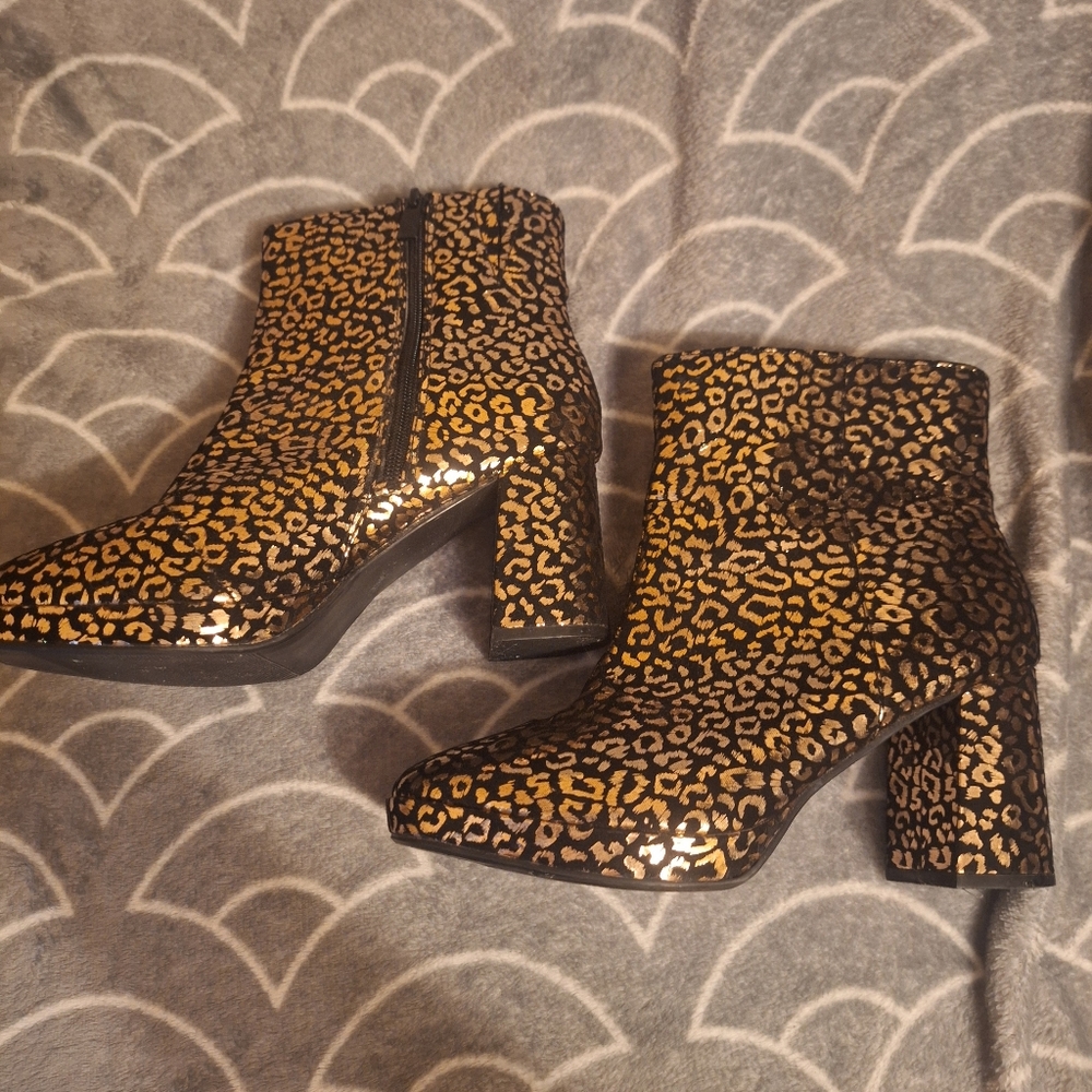 Torrid size 8.5WW black and gold animal print boots